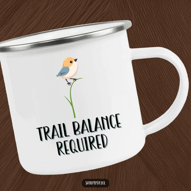 Funny camping mug showing a bird shape precariously balancing on a single, thin blade of grass, for outdoor amusement.