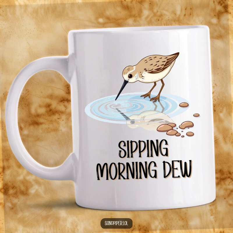 Funny sandpiper bird dipping its long beak into a sparkling tidal pool on a mug, capturing a peaceful beach moment.