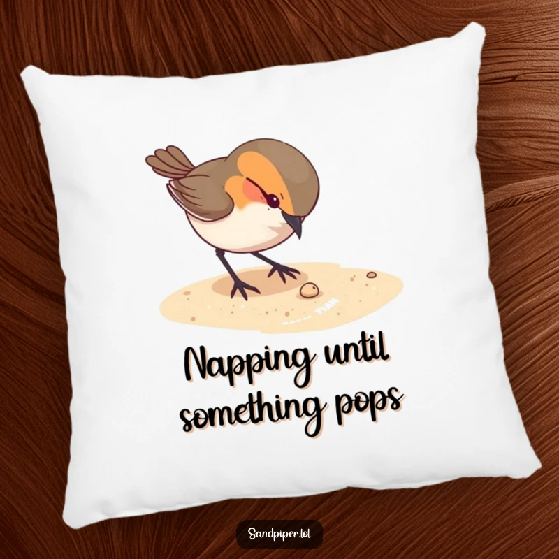 Funny decorative pillow featuring a curious bird pecking at something tiny on the sandy ground, offering cozy intrigue.