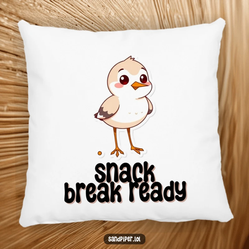 Funny sandpiper pillow, soft cushion with a cheerful bird looking for snacks, humorous home decor.