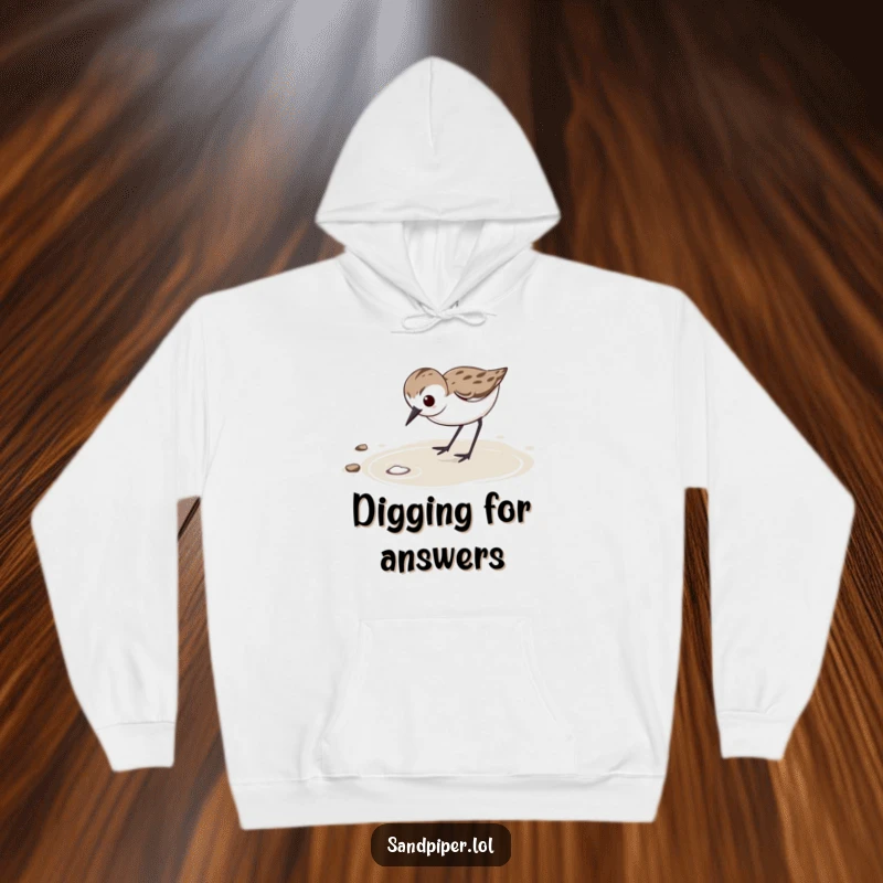 Funny Hoodie: Determined sandpiper with focused expression vigorously probes wet sand, offering cozy focus.
