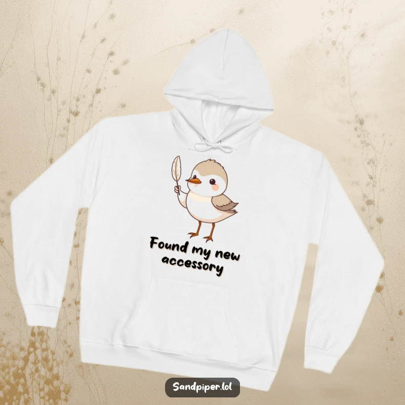 Funny Hoodie: A sandpiper bird proudly showcases a small feather, embodying care and appreciation for nature.