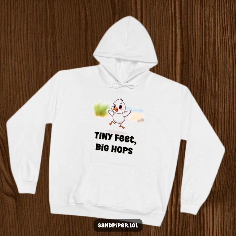 Funny Sandpiper Hoodie with a cheerful bird caught in a joyful hop, offering warmth and humor.
