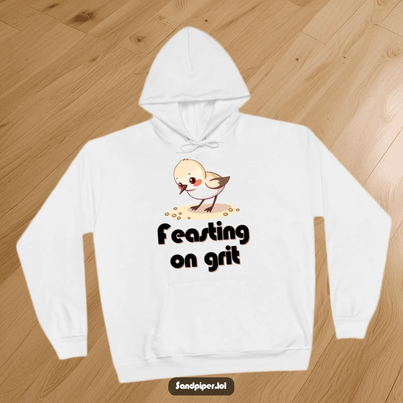 Funny Hoodie: A small sandpiper pecks at sand, perfect for cozy bird watching and seaside humor.