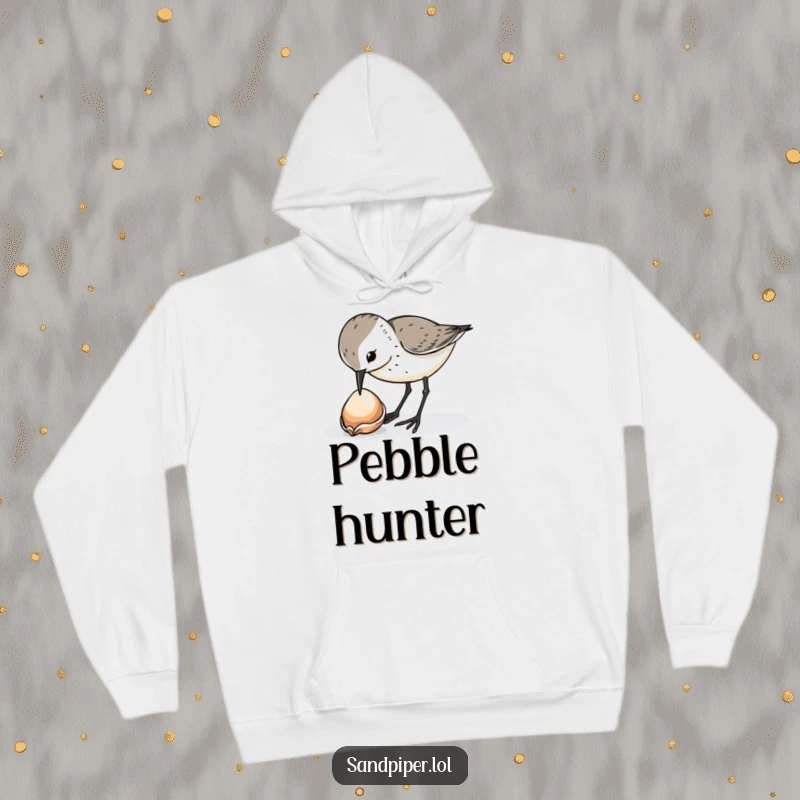 Funny sandpiper bird hoodie, curiously pecking at a shiny dropped shell, cozy, warm, perfect funny gift.