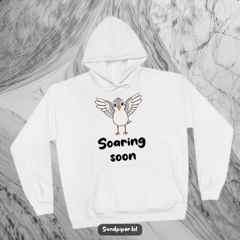 Funny hoodie depicting a sandpiper with wings spread, appearing ready to fly, offering warmth and a humorous, nature-inspired design.