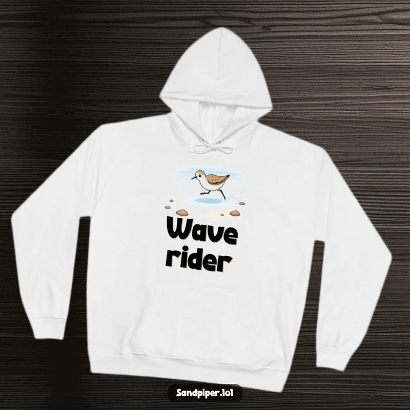 Funny Hoodie featuring a sandpiper playfully chasing the tide, offering warmth and humorous coastal adventure spirit.