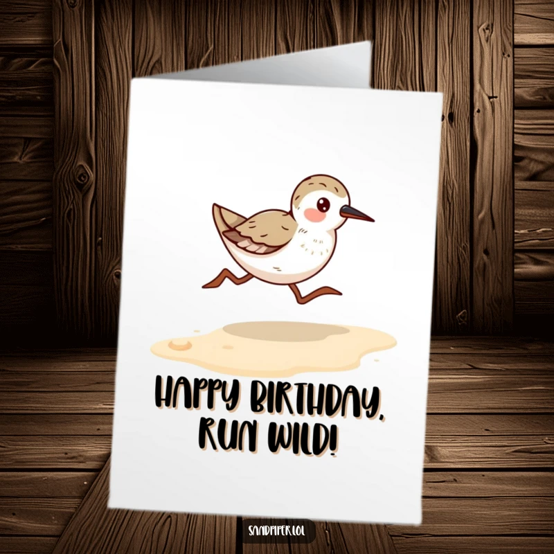 Funny free printable birthday card: a sandpiper bird sprints energetically along a wet, sandy beach shoreline.