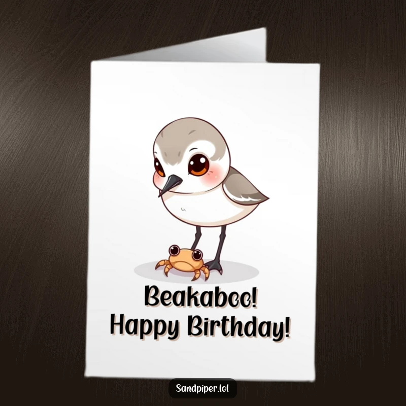 Funny Free Printable Sandpiper Birthday Card: A sandpiper with wide, curious eyes intently watching a tiny crab on the beach.