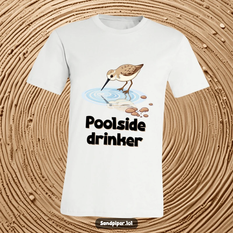 T-shirt featuring a funny sandpiper bird gently dipping its long beak into a shimmering tidal pool, perfect for bird watchers.