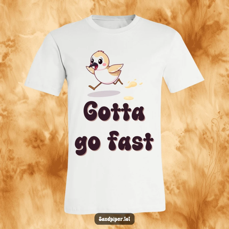 Funny t-shirt featuring a cute sandpiper character energetically running across a beach, embodying coastal freedom. A great funny gift.