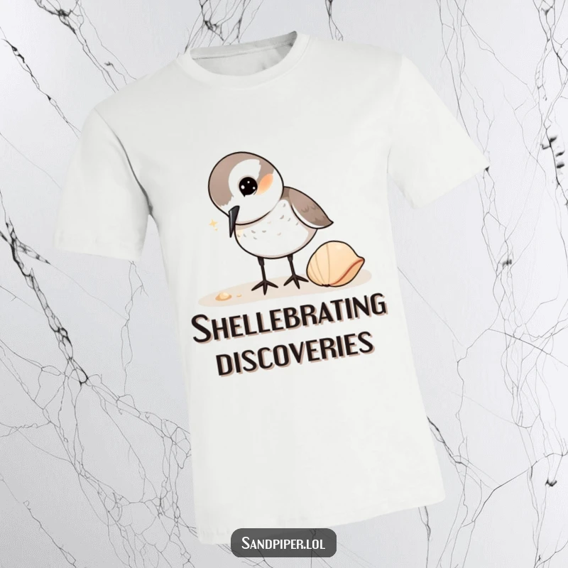 Funny Sandpiper T-Shirt: Adorable sandpiper with a head tilt, examining a shell, showcasing curiosity and gentle observation skills.