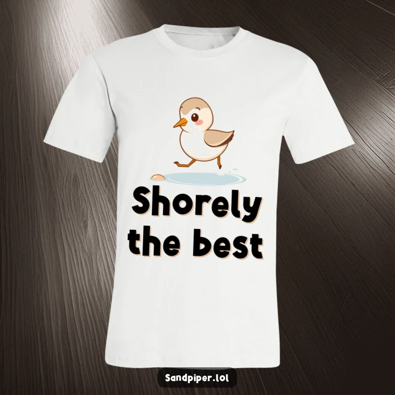 Funny t-shirt showing a cute sandpiper joyfully running along a tiny shore, capturing the essence of beachside happiness.