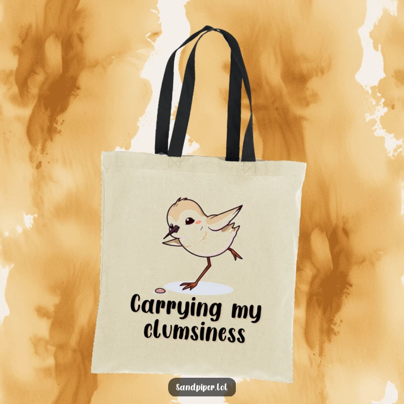 Funny sandpiper comically tripping and balancing, graphic tote bag, perfect for beachgoers and bird lovers.