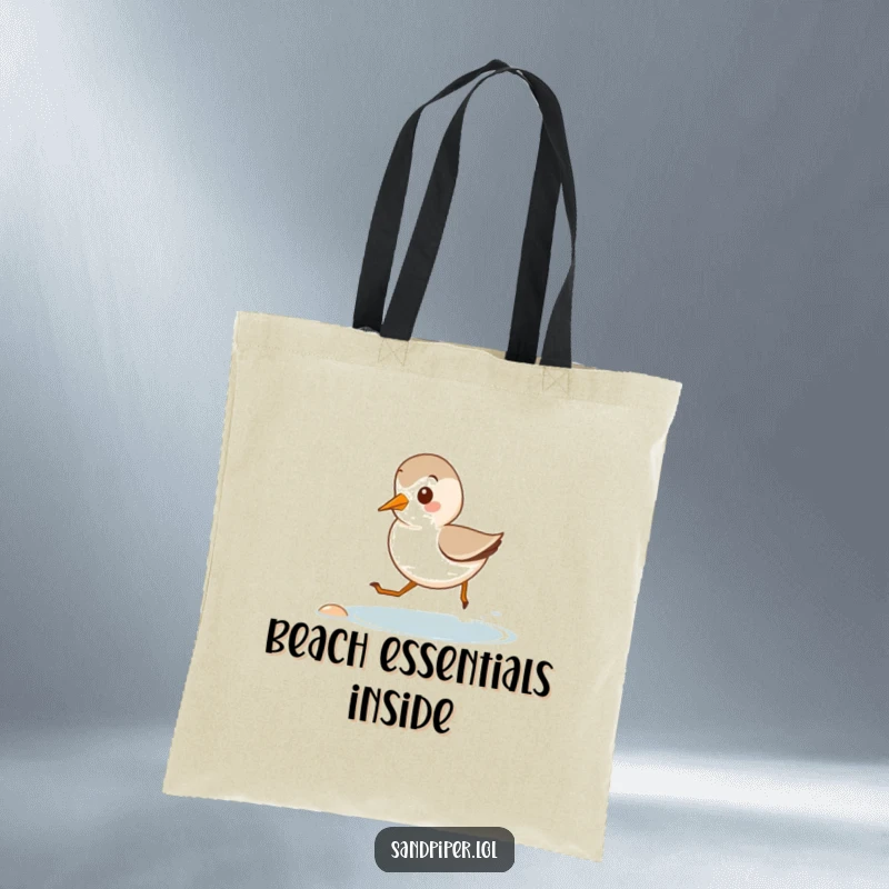 Funny tote bag featuring a cute sandpiper running along a tiny shore, perfect for beach trips and carrying coastal treasures.